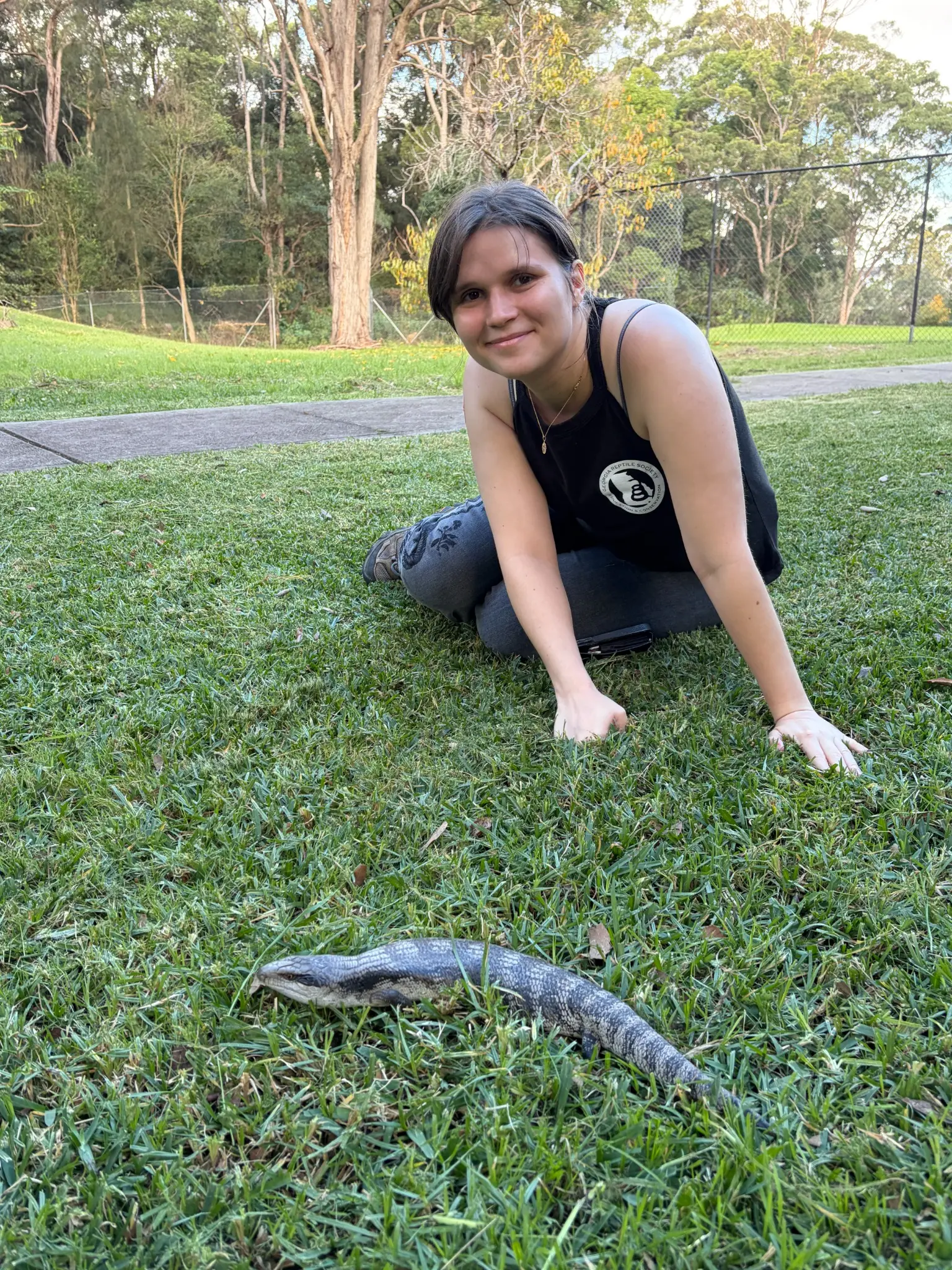 Dr Rachel Behrmann with a blue-tongued skink